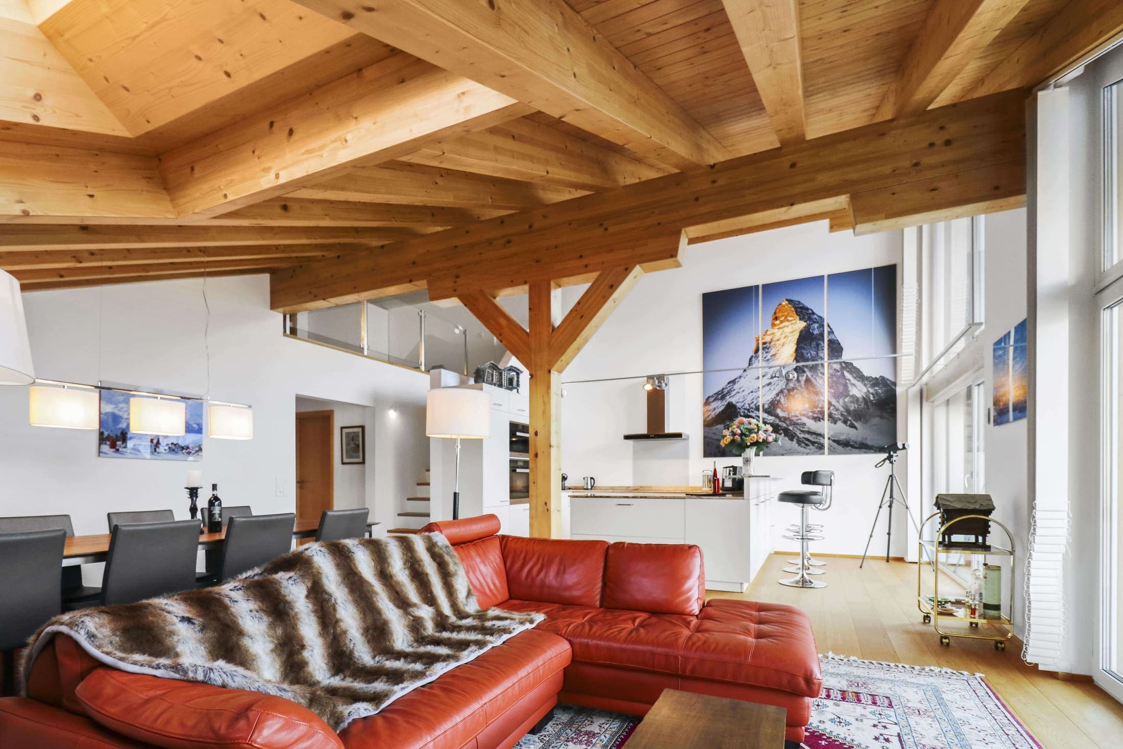 Alpine living room with red sofas